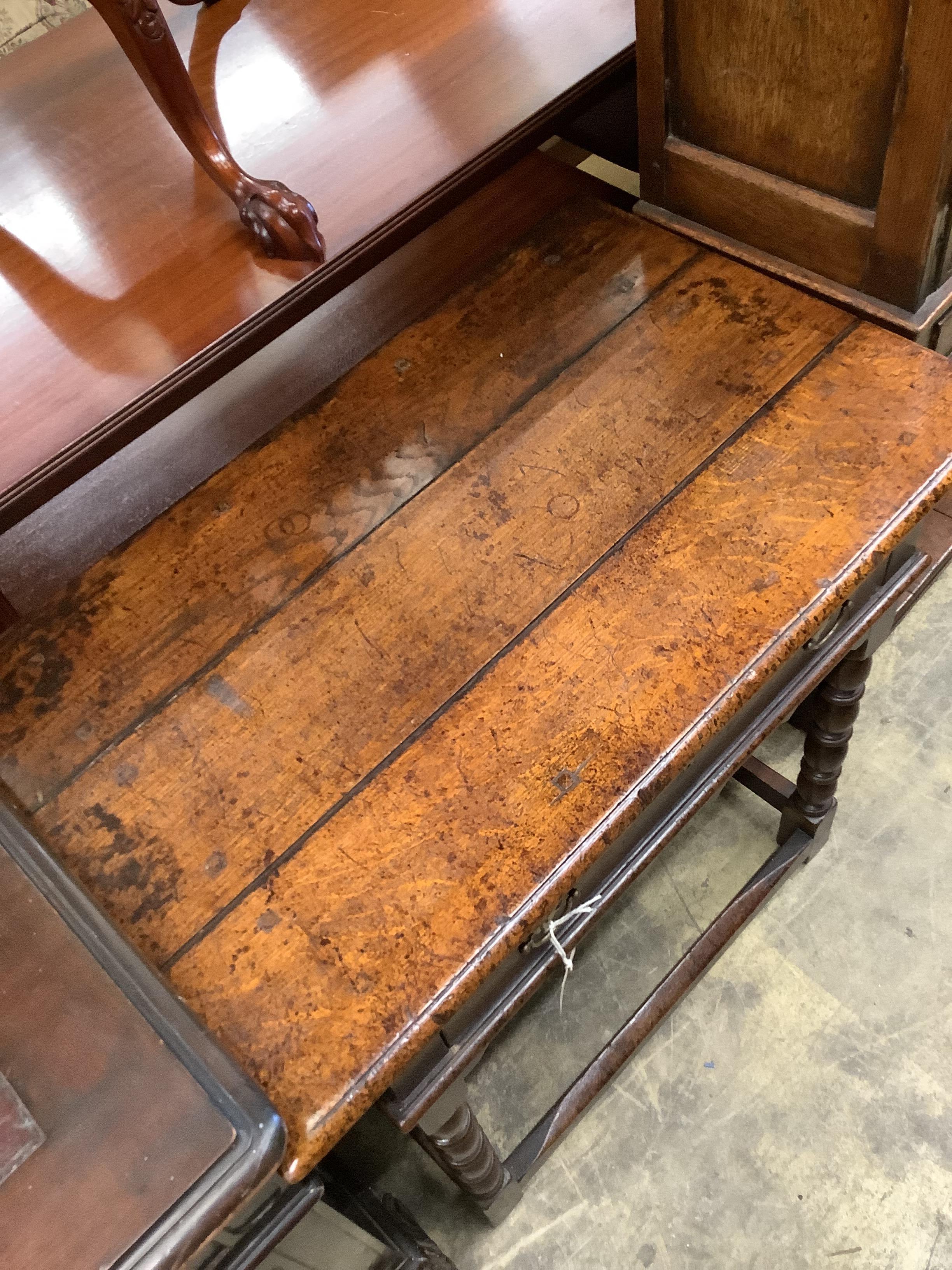 A 17th century style oak side table